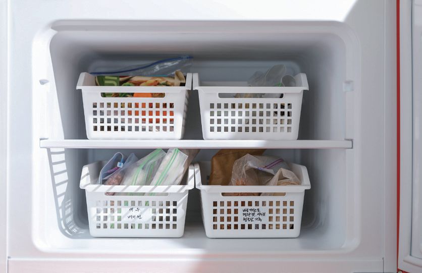 ▲冷凍庫確實以籃位分類，方便掌握各項食材分量。(圖片由采實文化提供。)